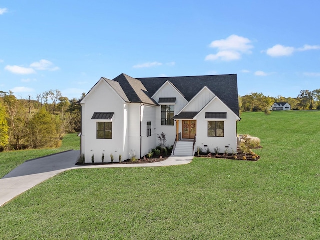 modern farmhouse with a front yard