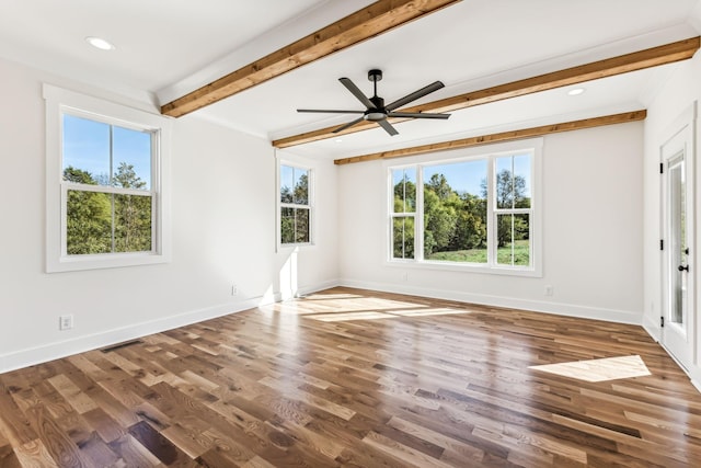 unfurnished room featuring dark hardwood / wood-style flooring, ceiling fan, and beamed ceiling