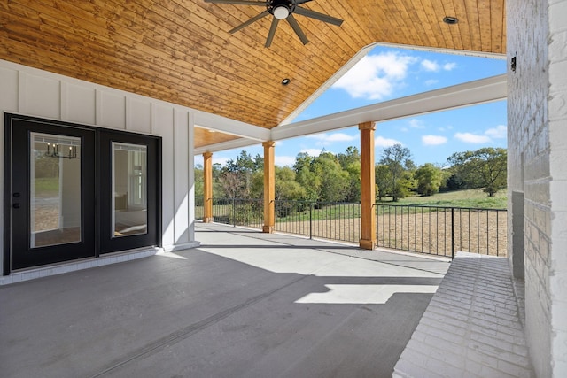 view of patio featuring ceiling fan