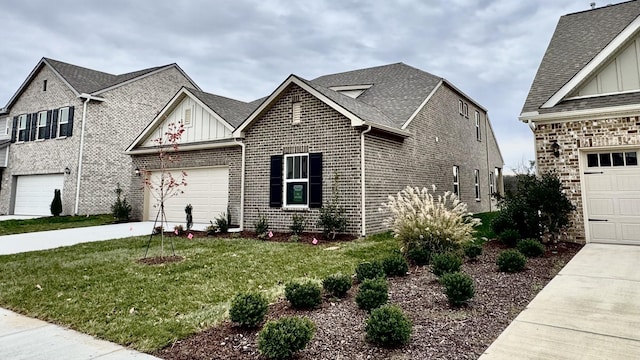 view of front of property featuring a front lawn and a garage