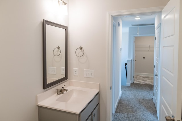 bathroom with visible vents and vanity