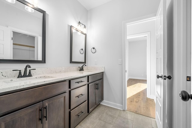 bathroom with vanity and tile patterned floors