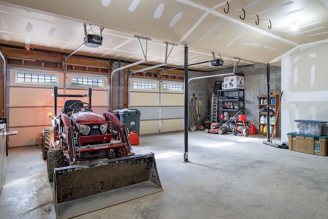 garage featuring a garage door opener