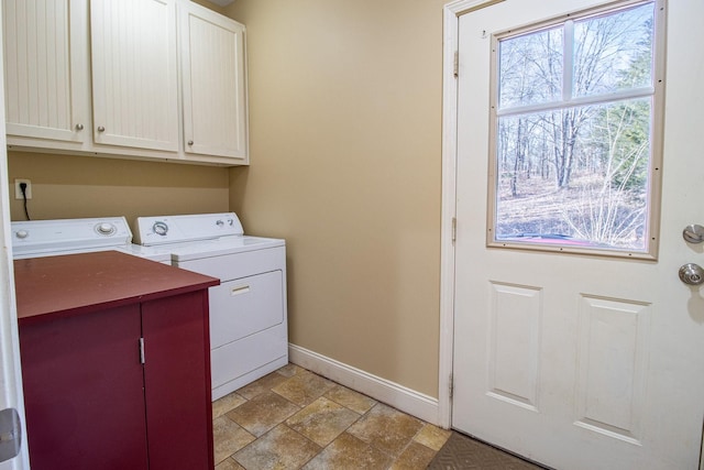 washroom with cabinets and independent washer and dryer