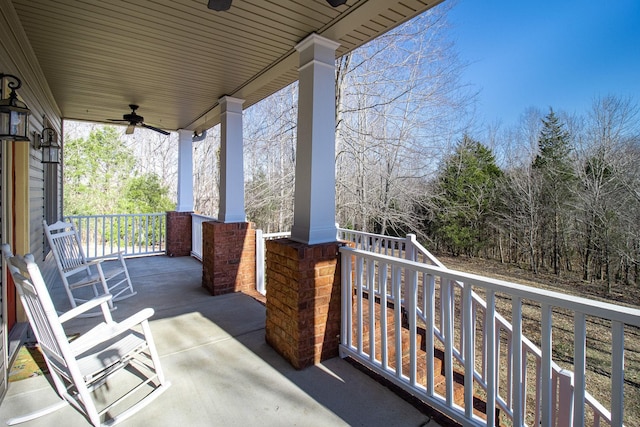 balcony featuring ceiling fan and covered porch