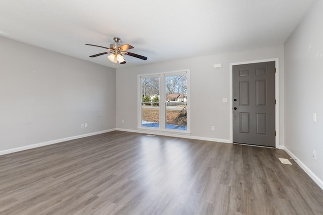 interior space featuring wood-type flooring and ceiling fan