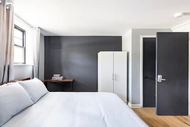 bedroom featuring light hardwood / wood-style flooring