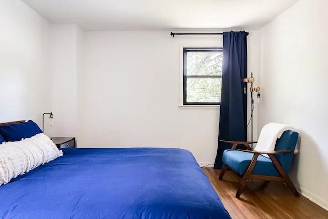 bedroom featuring hardwood / wood-style floors