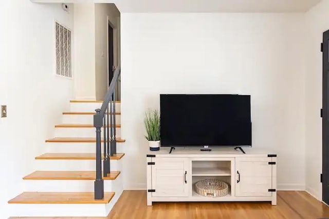 unfurnished living room featuring light hardwood / wood-style flooring