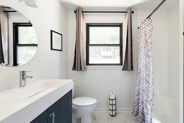 full bathroom with toilet, shower / bath combination with curtain, and vanity