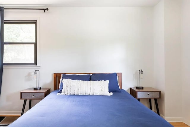 bedroom featuring hardwood / wood-style flooring