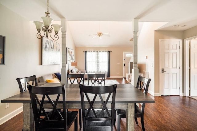 dining area with dark hardwood / wood-style flooring and ceiling fan with notable chandelier