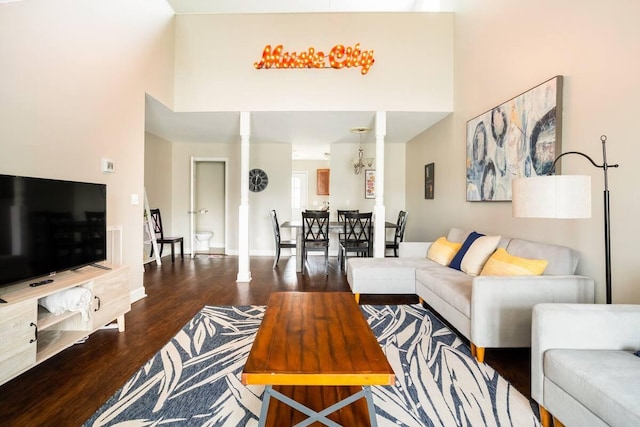 living room featuring dark hardwood / wood-style flooring