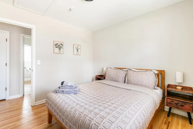 bedroom with light wood-type flooring