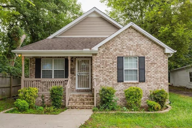 view of front of property featuring covered porch