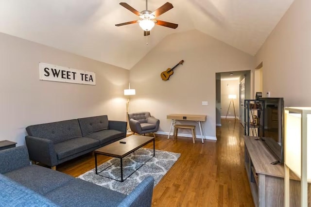 living room featuring ceiling fan, vaulted ceiling, and dark hardwood / wood-style flooring