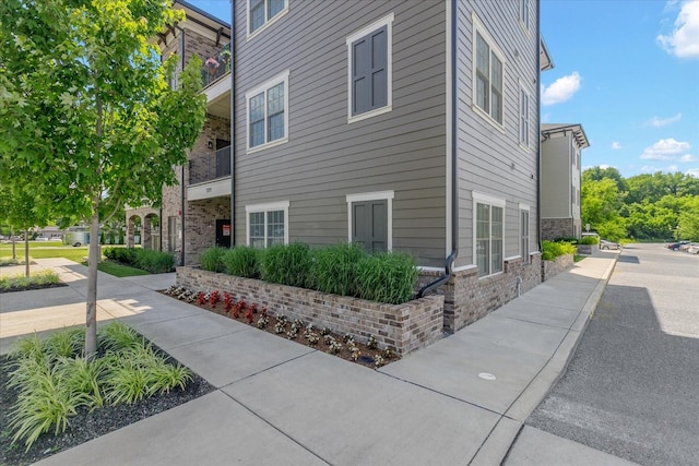 1319 W Main St Unit 103, Franklin, TN 37064 - view of side of property featuring stone siding