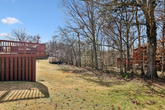 view of yard with a wooden deck