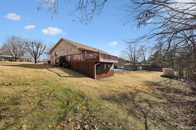 view of yard with a deck