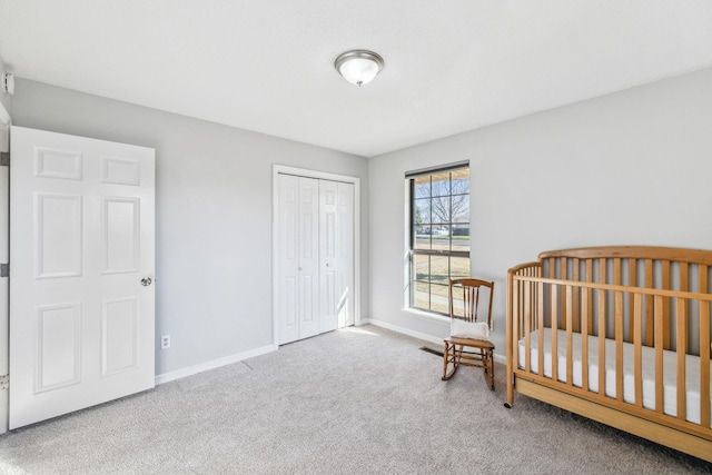 bedroom with a closet and carpet