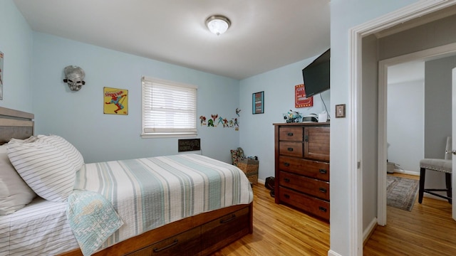 bedroom featuring light wood-type flooring