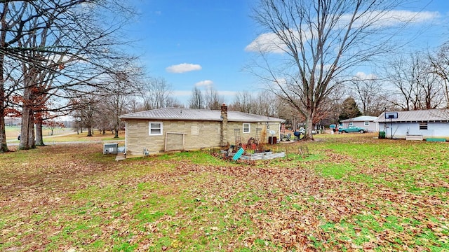 view of property exterior featuring a yard