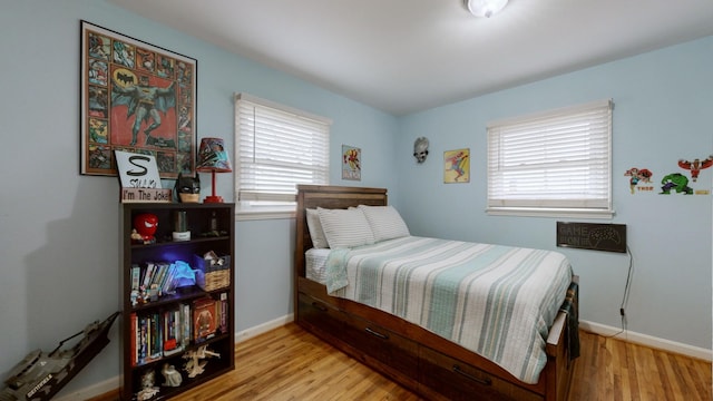 bedroom with light hardwood / wood-style floors