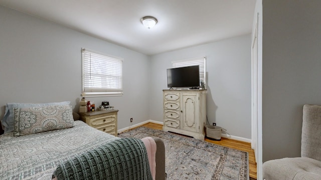 bedroom featuring light wood-type flooring