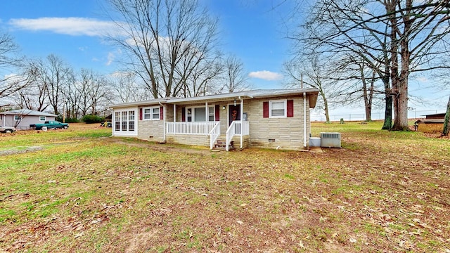 single story home featuring a porch and a front yard