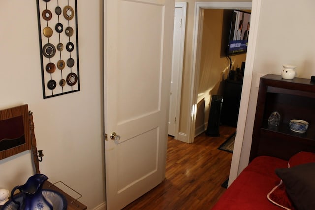 hall featuring dark hardwood / wood-style floors