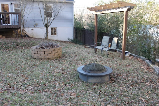 view of yard featuring a fire pit