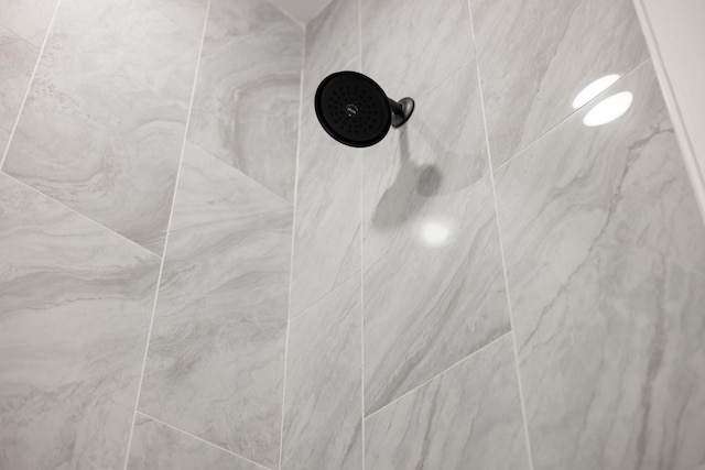 room details with a tile shower