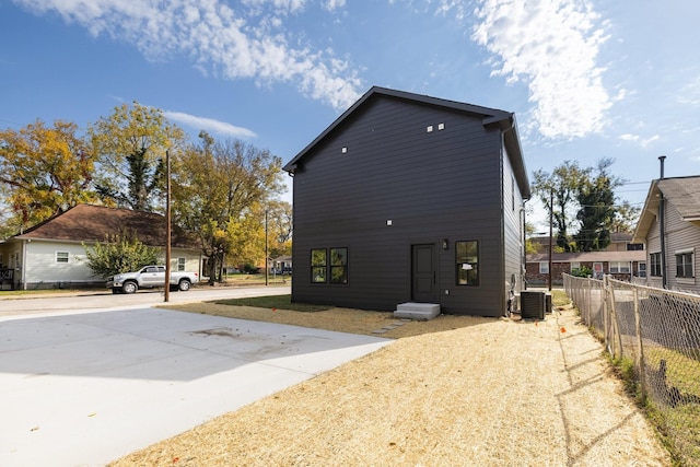 view of property exterior featuring central air condition unit