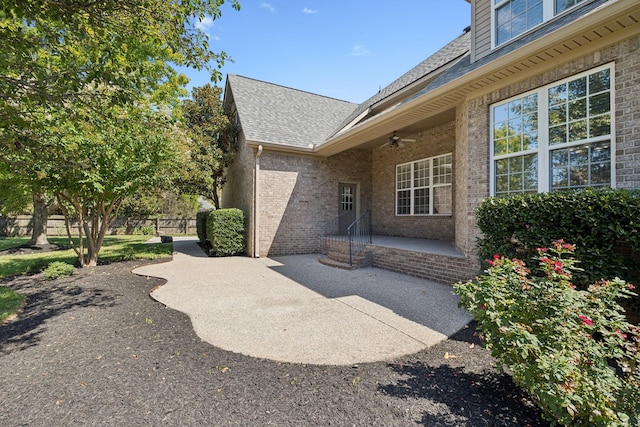 exterior space with a patio area and ceiling fan