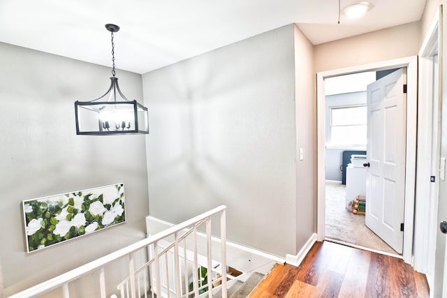 hallway featuring dark hardwood / wood-style floors