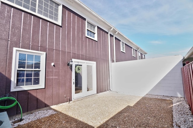 rear view of house with a patio and french doors