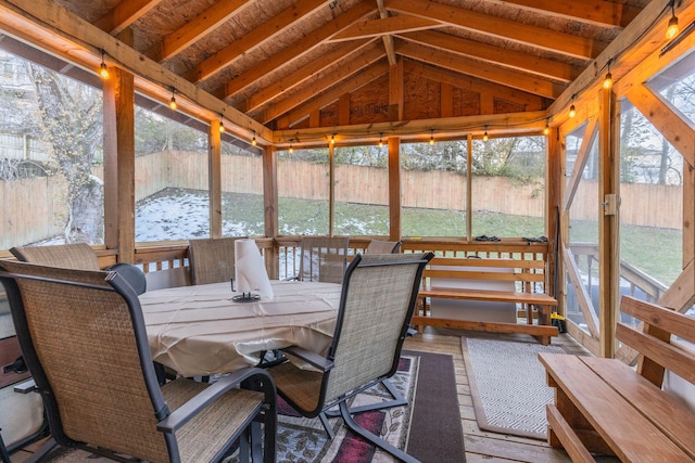 sunroom with vaulted ceiling