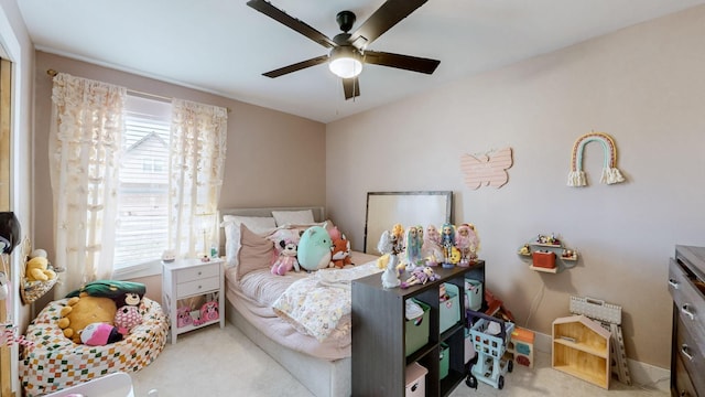 carpeted bedroom with ceiling fan