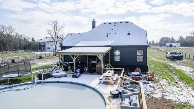 view of pool featuring a trampoline