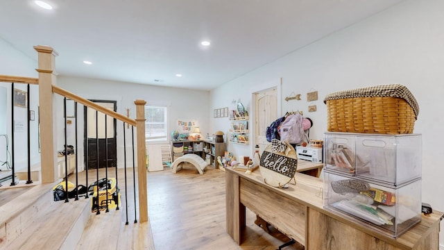 office area with light hardwood / wood-style flooring