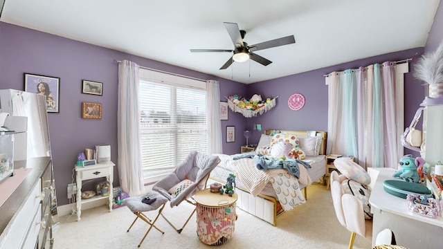 carpeted bedroom with ceiling fan