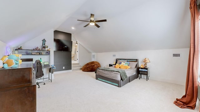 carpeted bedroom with lofted ceiling and ceiling fan