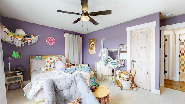 bedroom with carpet floors and ceiling fan