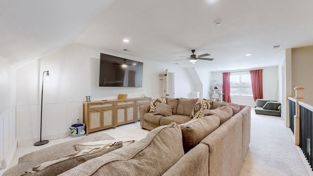 carpeted living room featuring lofted ceiling and ceiling fan