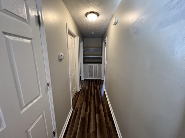 306 Turkey Creek Hwy, Carthage, TN 37030 - corridor featuring dark hardwood / wood-style flooring and a textured ceiling