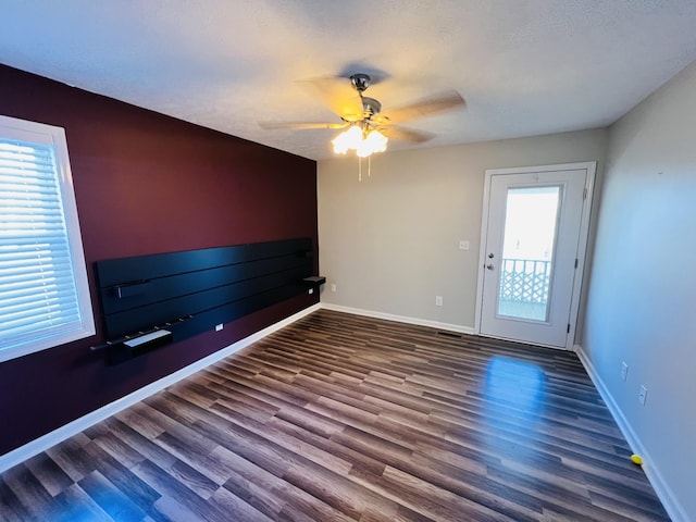 306 Turkey Creek Hwy, Carthage, TN 37030 - empty room with dark hardwood / wood-style floors and ceiling fan