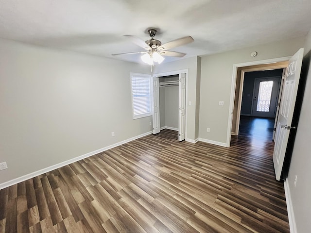 306 Turkey Creek Hwy, Carthage, TN 37030 - unfurnished bedroom featuring dark wood-type flooring, ceiling fan, and a closet
