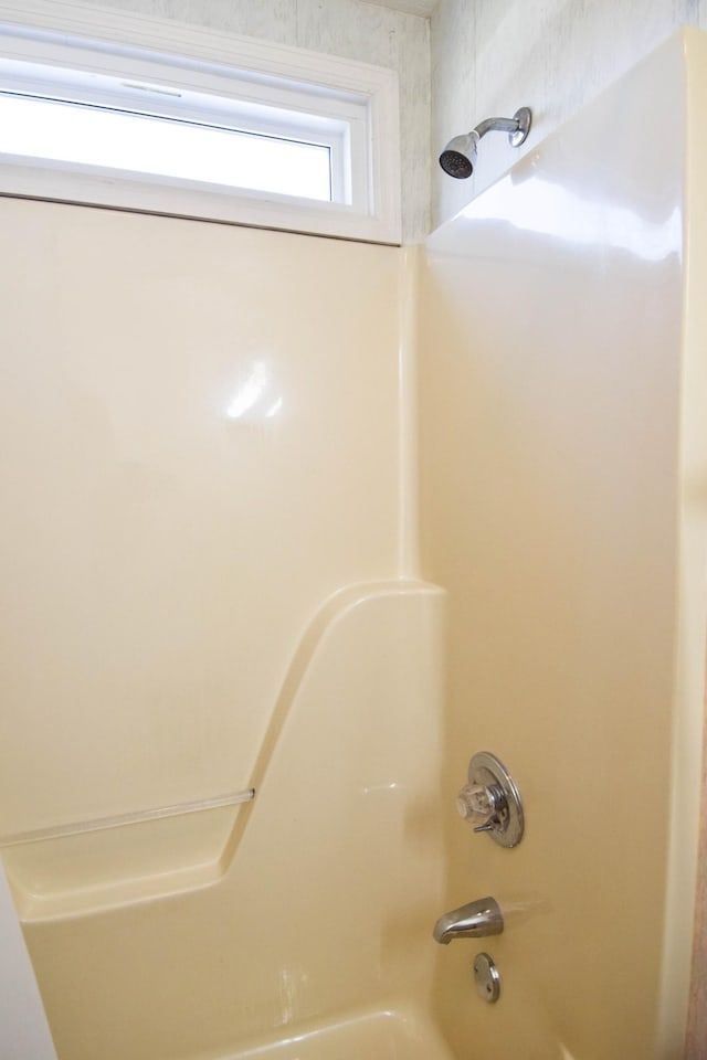 bathroom with shower / bathtub combination