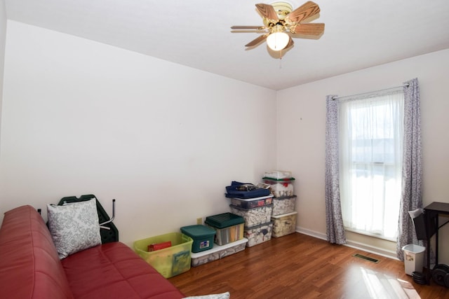 interior space featuring ceiling fan and hardwood / wood-style floors