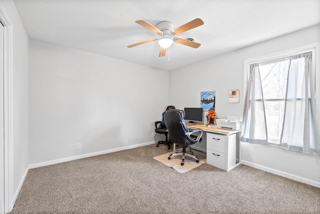 office featuring ceiling fan and carpet